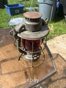 Antique Dietz Vesta railroad brakeman's lantern featuring a