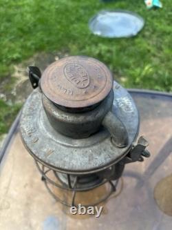 Antique Dietz Vesta railroad brakeman's lantern featuring a