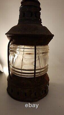Antique railroad lantern with thick fresnel glass