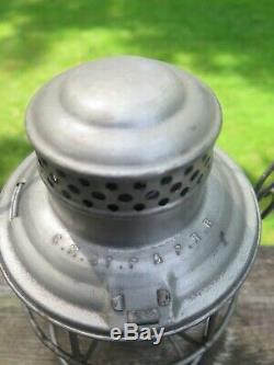 C. M. ST. P & P Railroad Lantern, RSA Signal Green globe (Adams Westlake Co.)