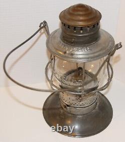 CM&StP Railway brass dome, bell bottom hand lantern with matched tall globe