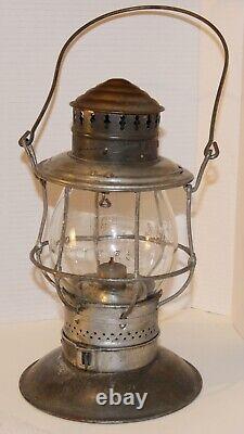 CM&StP Railway brass dome, bell bottom hand lantern with matched tall globe