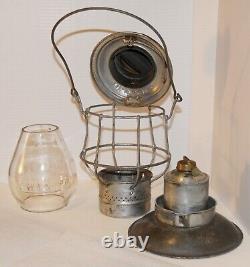CM&StP Railway brass dome, bell bottom hand lantern with matched tall globe