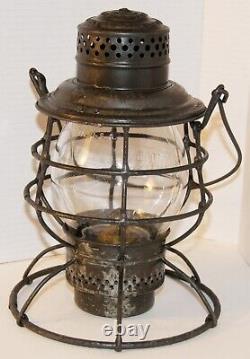 Chicago and North Western Railway tall hand lantern with matched cast globe