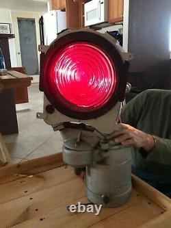 Vintage Railroad signal light by Safetran Systems Corp with red fresnel lens